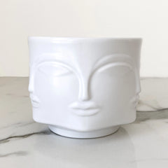White faces handmade candle jar